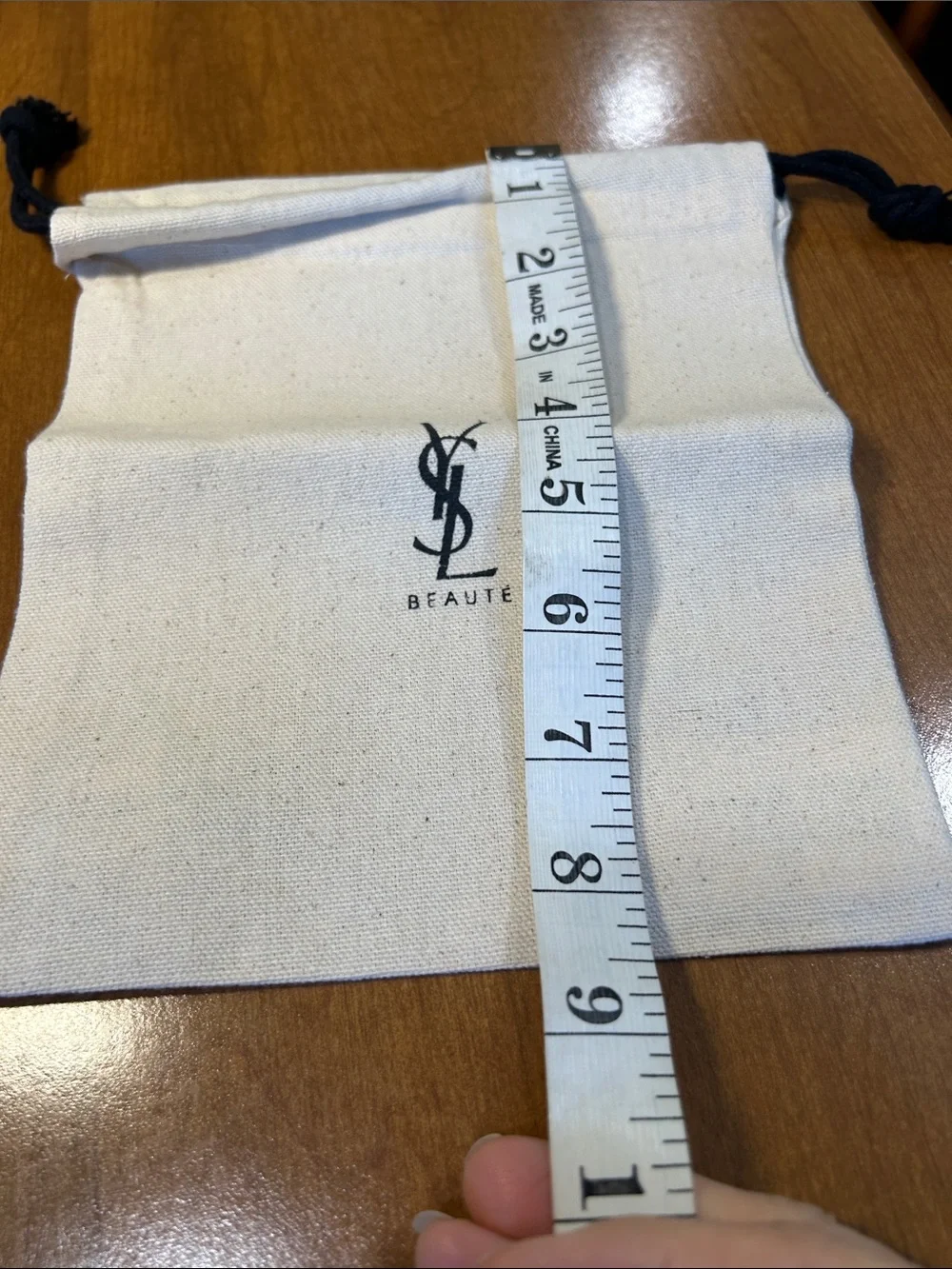 Yves Saint Laurent Neutral Canvas Drawstring Pouch with Black Logo